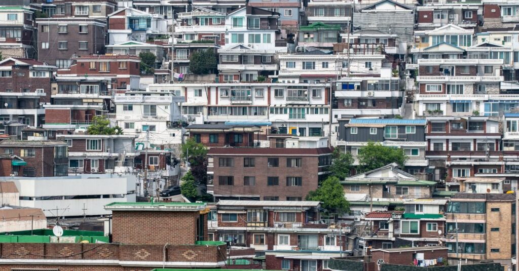 Vibrant urban landscape showcasing dense residential buildings in Seoul, South Korea.